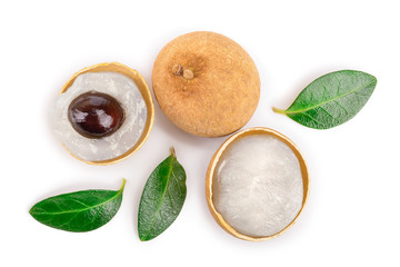 Fresh longan fruit with leaves isolated on white background. Top view. Flat lay