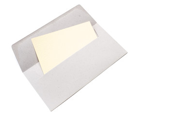 Open envelope with a letter or invitation card. Isolated on white background.