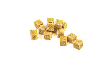 Pieces of cane sugar in the form of cubes