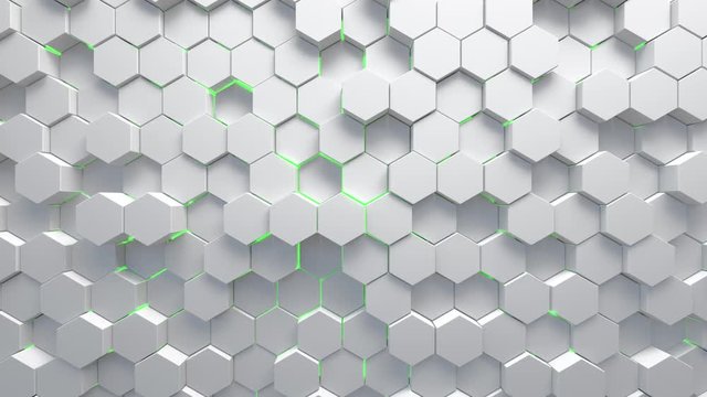 Abstract technological background made of white hexagons with green glow. Seamless loop
