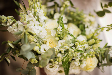 Obraz na płótnie Canvas bridal bouquet soft white and green foliage 