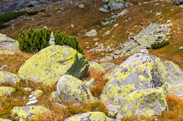 Hiking in High Tatras Mountains (Vysoke Tatry), Slovakia. Balancing stones seen in Mlynicka Valley on the way to Skok waterfall (1789m) © katatonia
