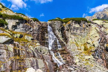 Hiking in High Tatras Mountains (Vysoke Tatry), Slovakia. Skok waterfall (Slovak: Vodopad Skok). 1789m. One of the most beautiful Tatra waterfalls © katatonia