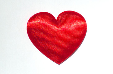 Decorative red silk  heart. Love  and Valentines day concept.