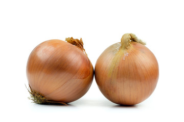 Two ripe yellow onion isolated on a white background