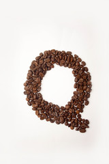 q letter. alphabet of coffee. coffee beans.