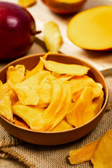 Dried Mango Fruit on Wooden Background. Selective focus.