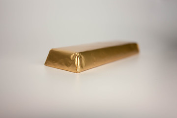 gold bar on a white background. photo