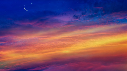 Crescent moon with beautiful sunset background . Generous Ramadan . Light from sky . Religion background .