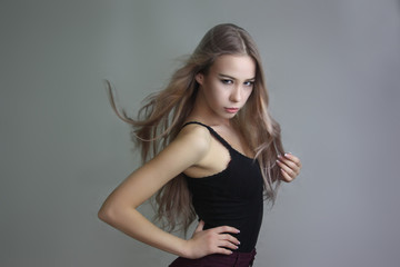 Fototapeta premium sexy girl. model with developing hair.
