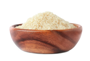 Bowl with uncooked parboiled rice on white background