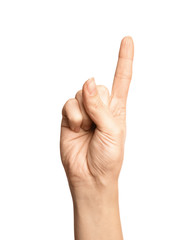 Woman showing number one on white background, closeup. Sign language