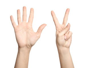 Woman showing sign seven on white background, closeup. Body language