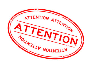 Grunge red attention word oval rubber seal stamp on white background