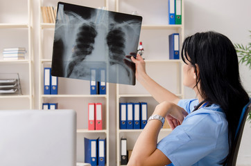 Female doctor radiologist working in the clinic 