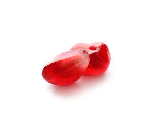 Pomegranate seeds on white background. Delicious fruit