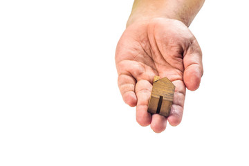 House wood miniature with hand on white background