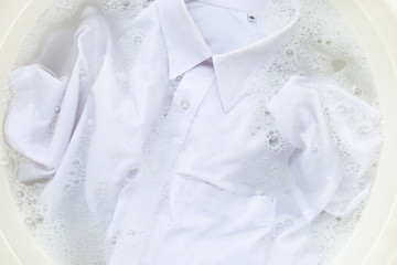 Soak  cloth before washing, white shirt