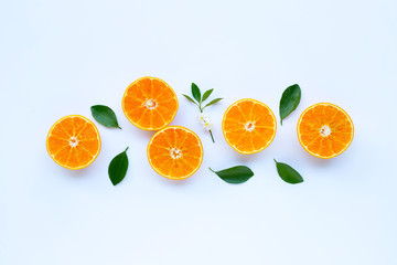 High vitamin C, Orange fruits with leaves on white background.