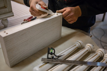 Making furniture from wood. Work carpenter. Carpentry tools.