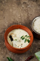 Pachadi - winter melon in coconut yogurt gravy, selective focus