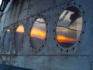 Abandoned Airplane at Sunset