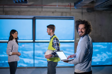 business people in group, architect and engineer on construction site