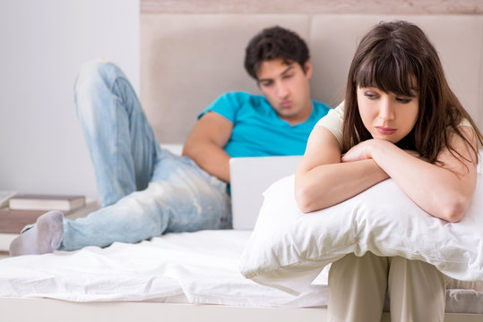 Woman feeling lonely with husband