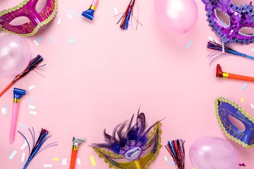 Peel and stick wall murals Carnival Table top view aerial image of beautiful colorful carnival season or photo booth prop Mardi Gras background.Flat lay objects colorful mask with confetti and decorations to party on pink paper.