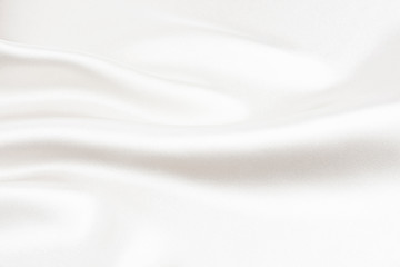Obraz premium The texture of the satin fabric of white color for the background