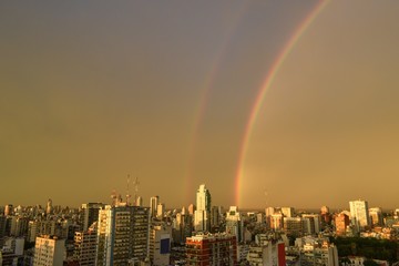 double rainbow over belgrano neighborhood, buenos aires, and rio de la plata river, Argentina