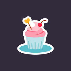 Cupcake decorated with heart icon.