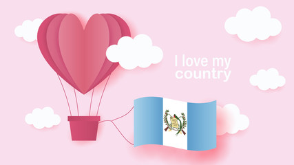 Hot air balloons in shape of heart flying in clouds with national flag of Guatemala. Paper art and cut, origami style with love to Guatemala