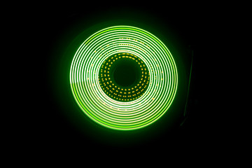 Concept of speed - Trail of fire and smoke - Vinyl record. Burning vinyl disk. Turntable vinyl record player. Retro audio equipment for disc jockey. Sound technology