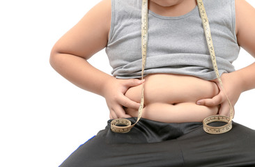 boy measuring his belly with measurement tape