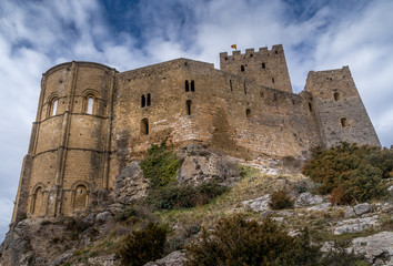 Winter view of medieval partially restored Romanesque Loarre castle near Huesca in Aragon region Spain with round towers, donjon, on top of a high rock