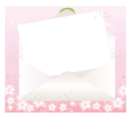 開いた封筒と便箋・桜