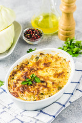 Cheesy suffed cabbage and mushroom casserole. Selective focus, space for text.