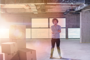 portrait of young businessman on construction site