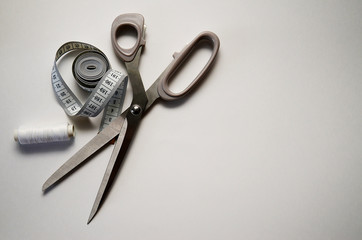 sewing kit fabric and accessories on a light background