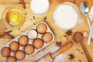 Food ingredients for baking: flour, eggs, milk, sugar