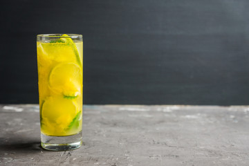 Fresh pineapple mojito on rustic background. Selective focus. Shallow depth of field.