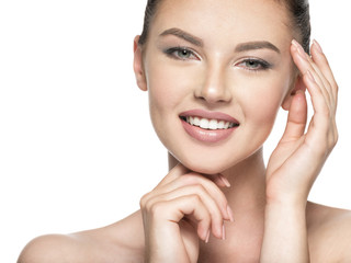 Beautiful woman cares for the skin face - isolated on white
