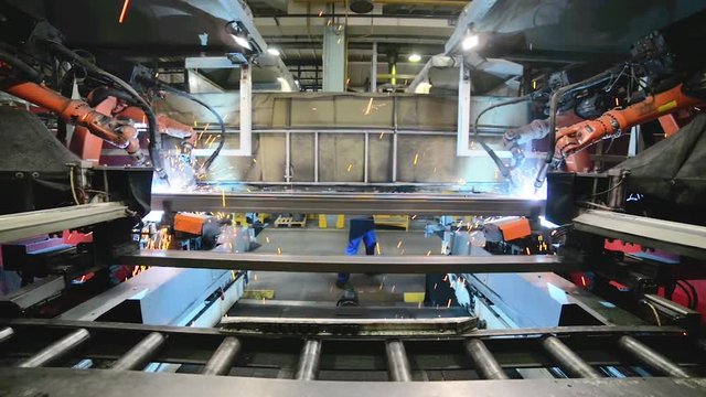 Welding robot, the process of welding a metal profile.