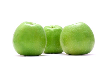 Green apples isolated on a white background.
