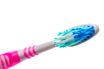 colored toothbrush on an isolated background, close up