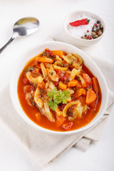 Stewed vegetables. Vegetable ragout of sweet pepper, carrot, onion, tomatoes. Vegetarian food.