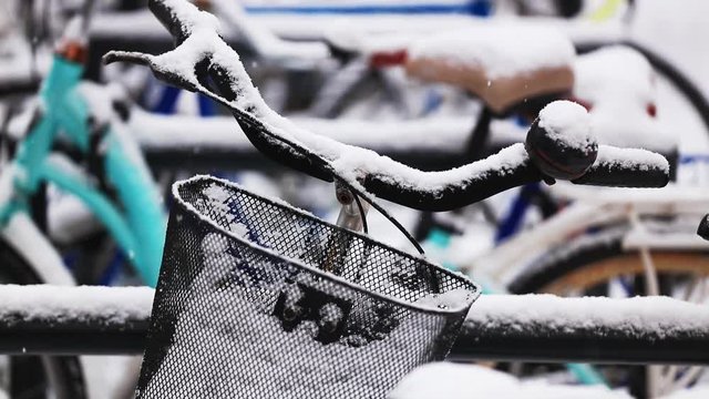 video of a vintage bike during a heavy snowfall in Europe