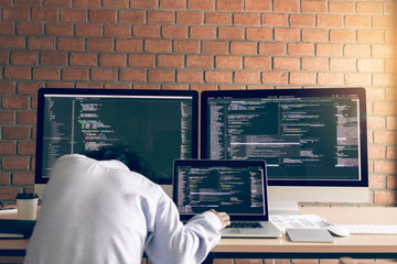 Man programmers are sleeping while working analyzing on desk in code at office room.