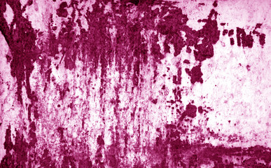 Grungy rusted metal surface in pink tone.